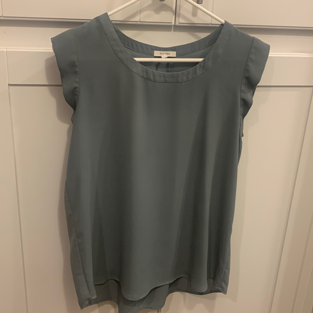 Sleeveless light green blouse